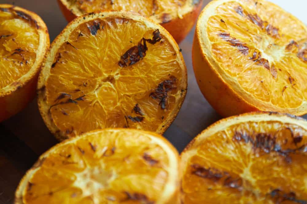 Grilled orange halves. 