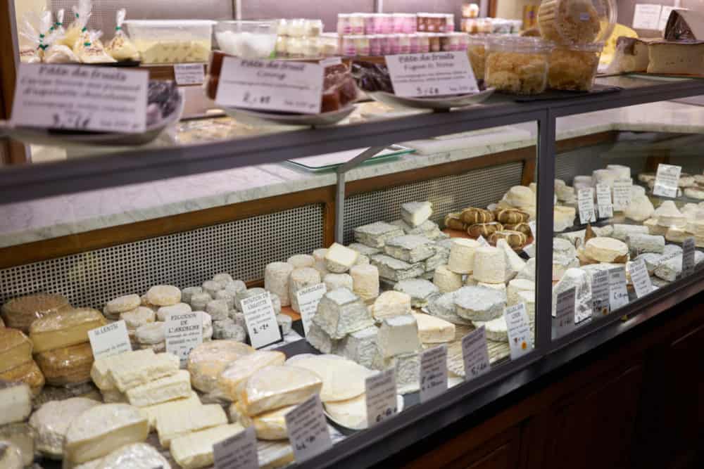 French cheeses in a refrigerated case at Fromagerie Jouannault in the Marais neighborhood of Paris. 