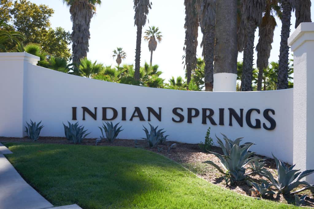 White hotel entrance gate for Indian Springs in Calistoga, CA