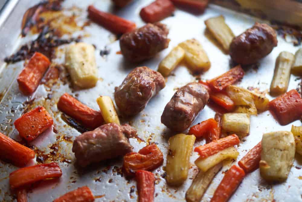 Roasted sausages, carrots and parsnips.