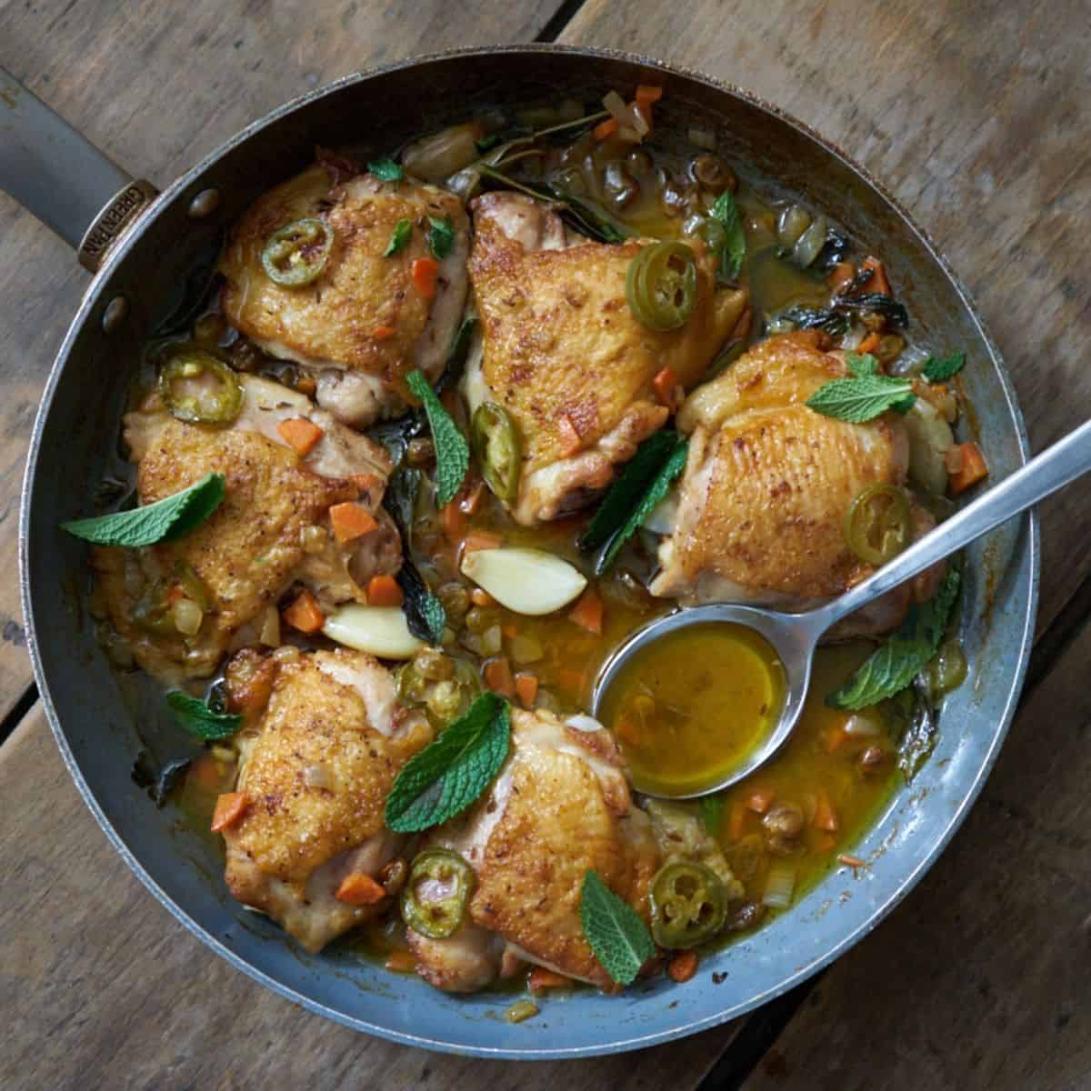 Chicken Escabeche with Jalapeños, Golden Raisins and Mint