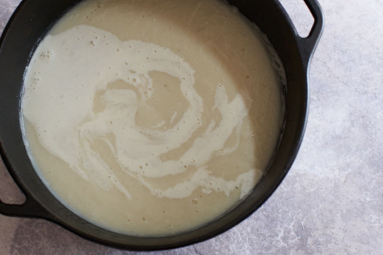 Creamy cauliflower soup in a pot.