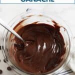 A bowl of dark chocolate ganache with a spoon in it, chocolate chips are on the left, a blue and white towel is on the right.