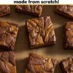 Pumpkin swirl brownies on brown parchment paper.