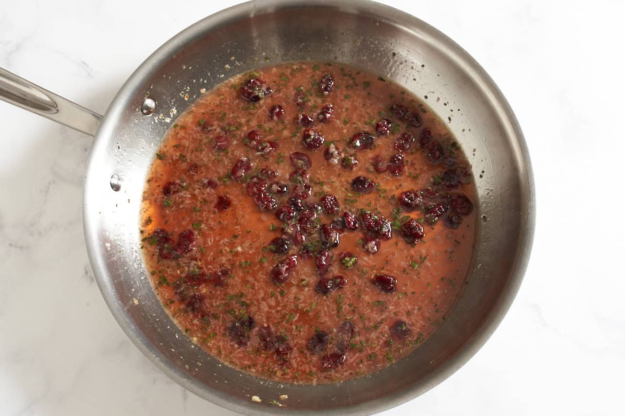 Cranberry agrodolce in a skillet.